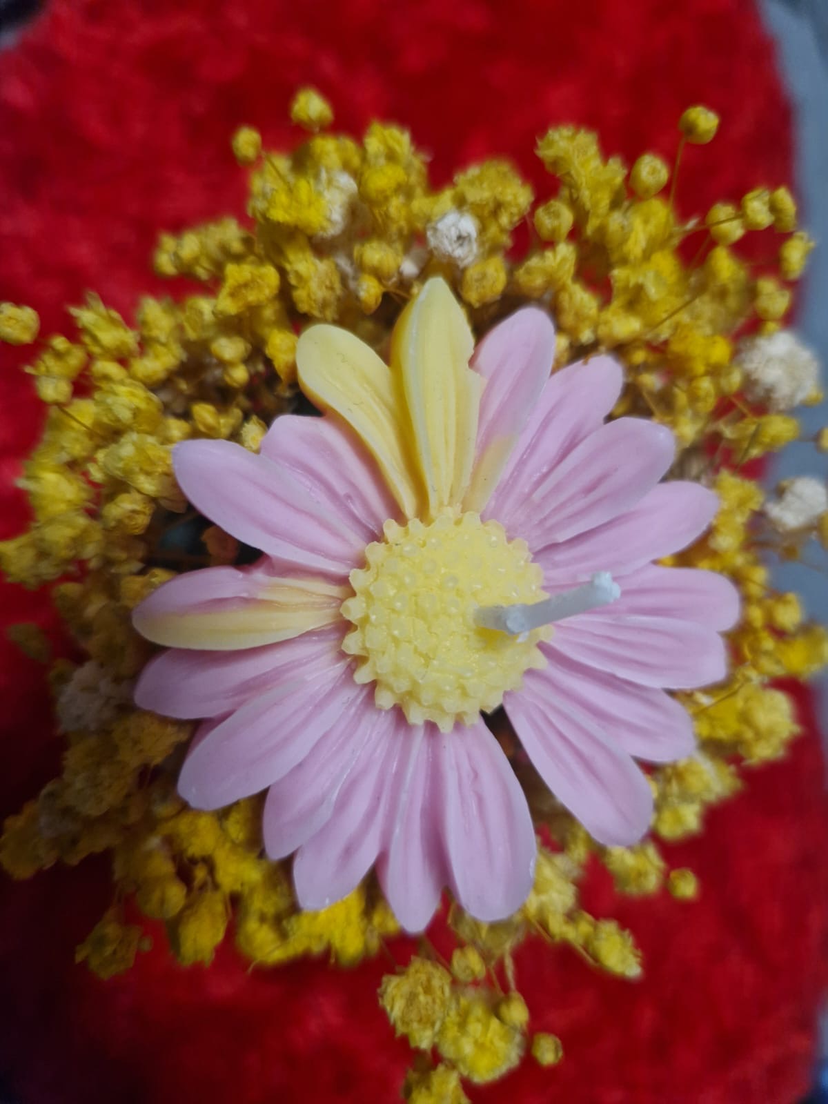 Kleiner Blumentopf mit Blumenkerze