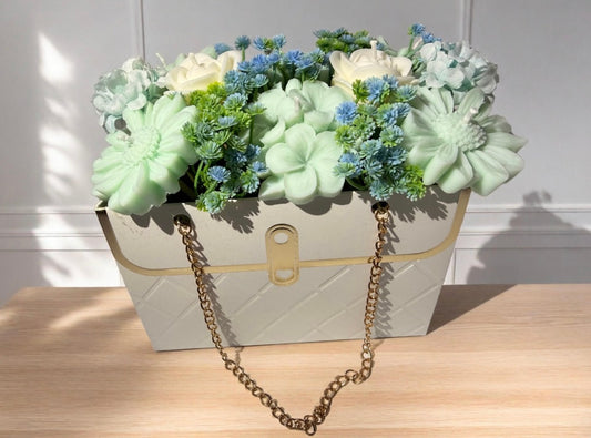 Kerzengesteck Blumen Handtasche